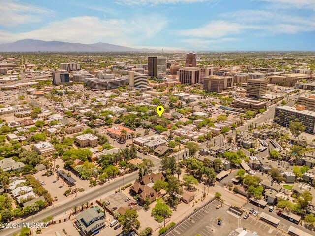 birds eye view of property with a mountain view