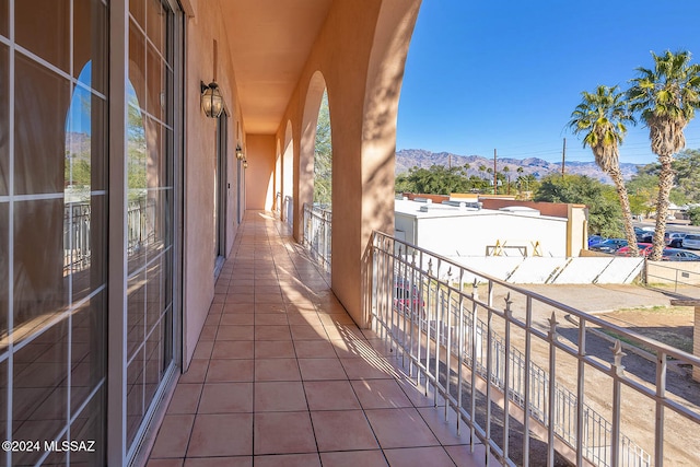 balcony featuring a mountain view