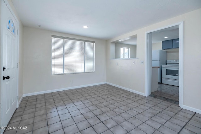 view of tiled spare room