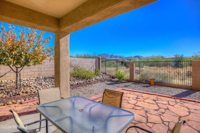 view of patio with a mountain view