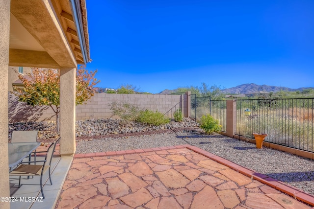 view of patio featuring a mountain view