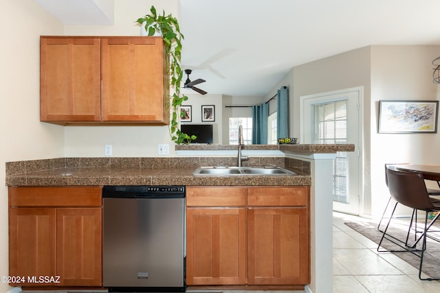 kitchen featuring kitchen peninsula, sink, ceiling fan, dishwasher, and light tile patterned flooring