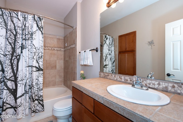 full bathroom with shower / bath combo, vanity, and toilet