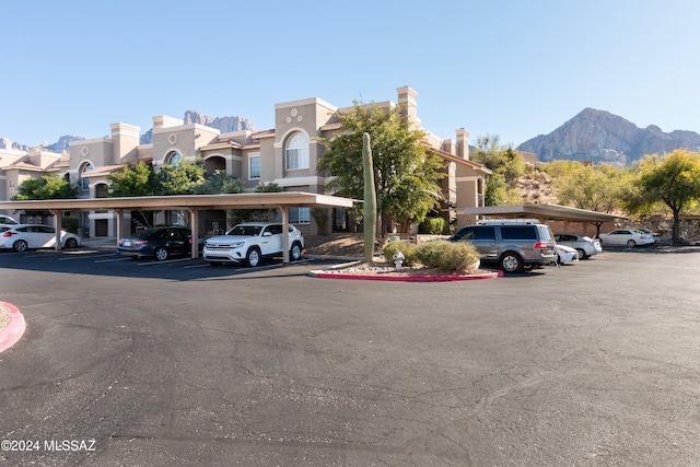 view of building exterior with a mountain view