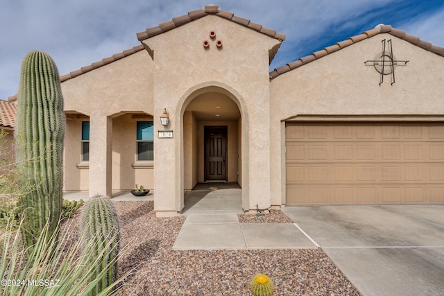 view of front of home with a garage