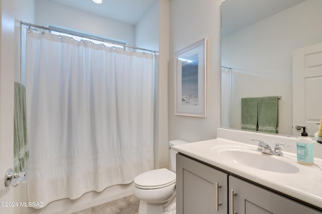 full bathroom featuring shower / bath combination with curtain, toilet, and vanity