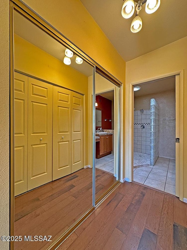 8034 E Shadow Ln, Tucson, AZ 85750 - hall with hardwood / wood-style flooring and a sink