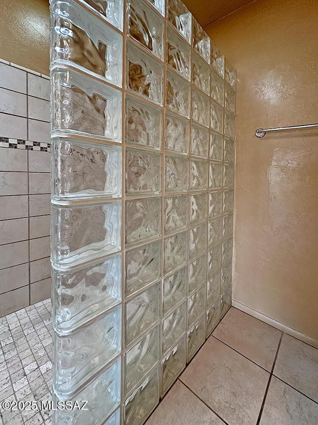 8034 E Shadow Ln, Tucson, AZ 85750 - bathroom featuring walk in shower and tile patterned flooring