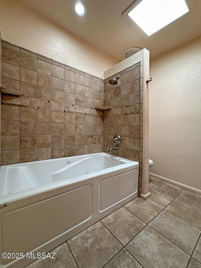8034 E Shadow Ln, Tucson, AZ 85750 - bathroom with a textured wall, tile patterned floors, toilet, and shower / bathtub combination