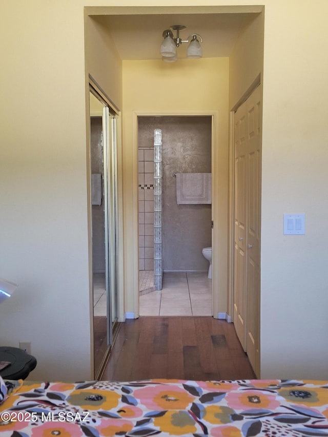 hall featuring tile patterned flooring