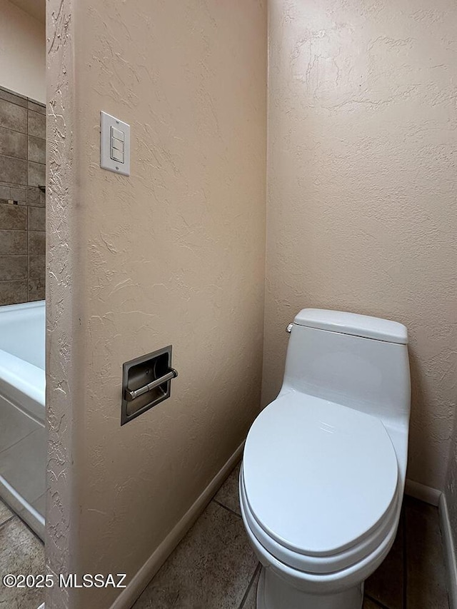 8034 E Shadow Ln, Tucson, AZ 85750 - bathroom featuring toilet and tile patterned flooring