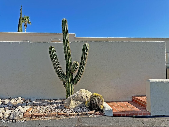 8034 E Shadow Ln, Tucson, AZ 85750 - exterior view of stucco siding