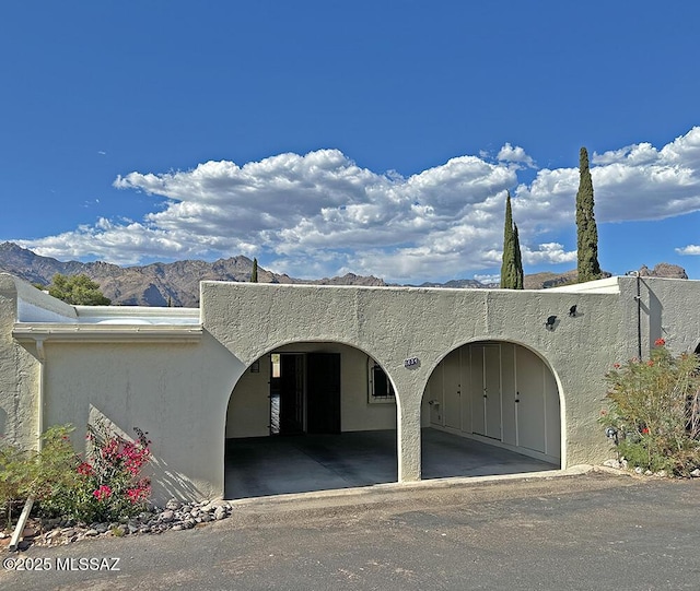 8034 E Shadow Ln, Tucson, AZ 85750 - garage featuring a mountain view