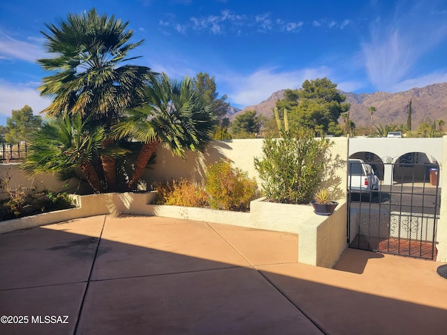 view of patio featuring a mountain view