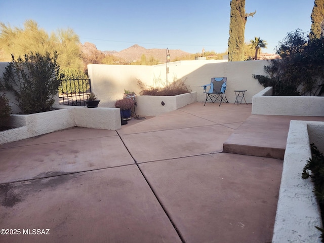 view of patio featuring a mountain view