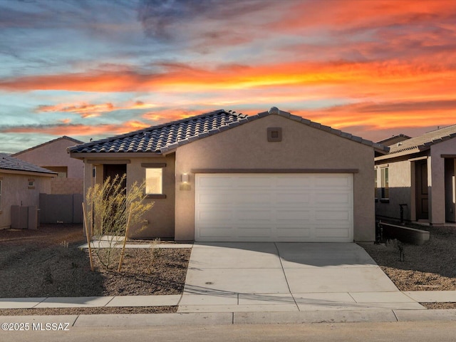 view of front of home with a garage