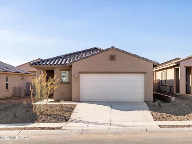 view of front of property with a garage