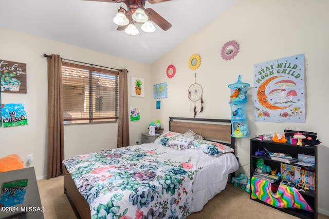 carpeted bedroom with ceiling fan and vaulted ceiling