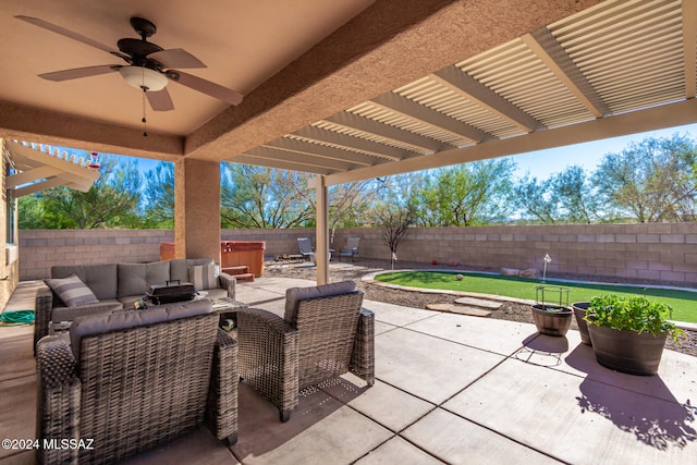 view of patio / terrace with outdoor lounge area, a pergola, a hot tub, and ceiling fan