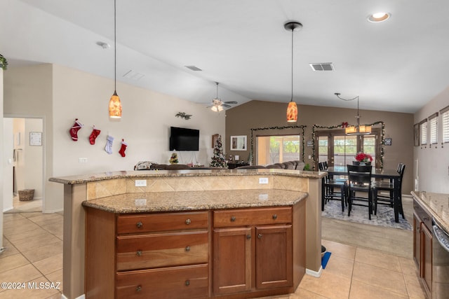 kitchen with hanging light fixtures, light tile patterned floors, vaulted ceiling, and ceiling fan