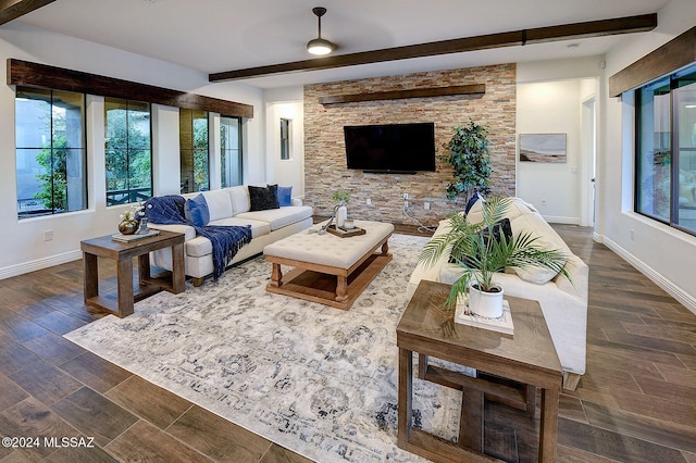 living room featuring beam ceiling