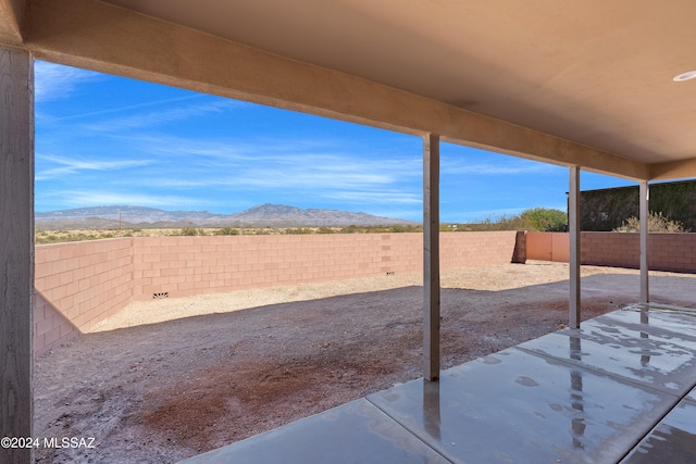 view of patio featuring a mountain view