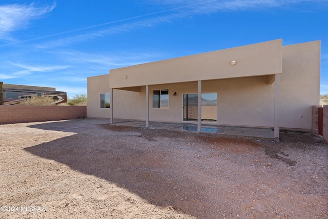 rear view of house featuring a patio area