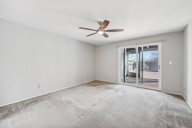 611 S Los Opalos, Green Valley, AZ 85614 - carpeted empty room featuring a ceiling fan and baseboards