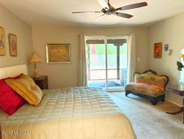 611 S Los Opalos, Green Valley, AZ 85614 - bedroom with access to outside, carpet floors, and a ceiling fan