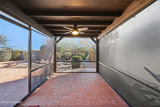 611 S Los Opalos, Green Valley, AZ 85614 - unfurnished sunroom with ceiling fan and beam ceiling