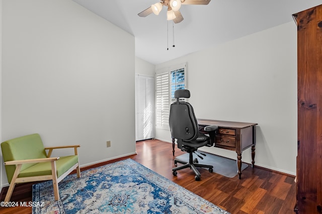 home office with dark hardwood / wood-style floors, ceiling fan, and lofted ceiling