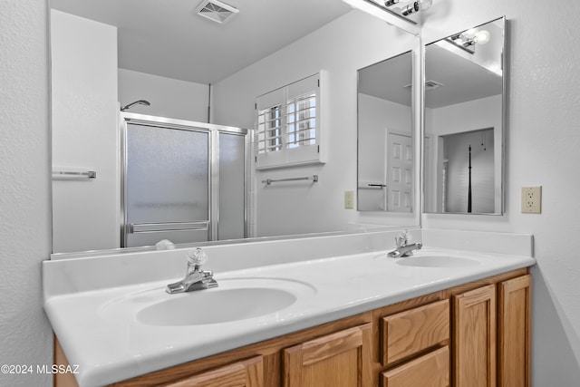 1955 E E Clf, Swallow Trail, Green Valley, AZ 85614 - full bathroom featuring a stall shower and double vanity