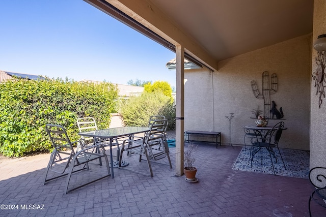 1955 E E Clf, Swallow Trail, Green Valley, AZ 85614 - view of patio with outdoor dining space
