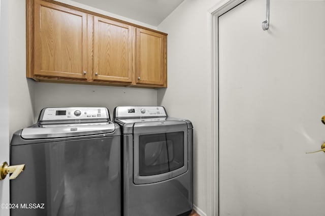 1955 E E Clf, Swallow Trail, Green Valley, AZ 85614 - washroom featuring separate washer and dryer and cabinet space