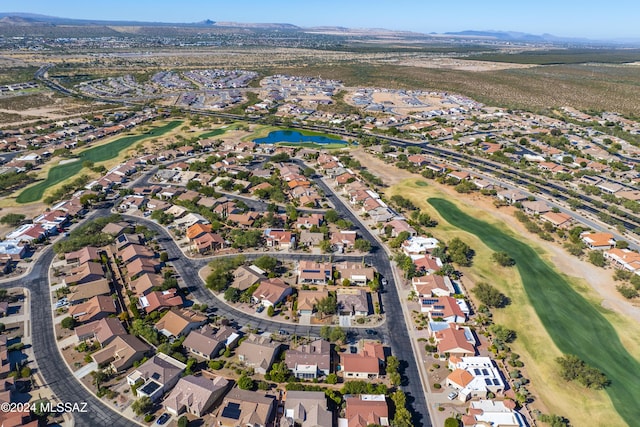1955 E E Clf, Swallow Trail, Green Valley, AZ 85614 - aerial view of property's location with a golf course, nearby suburban area, and a water and mountain view