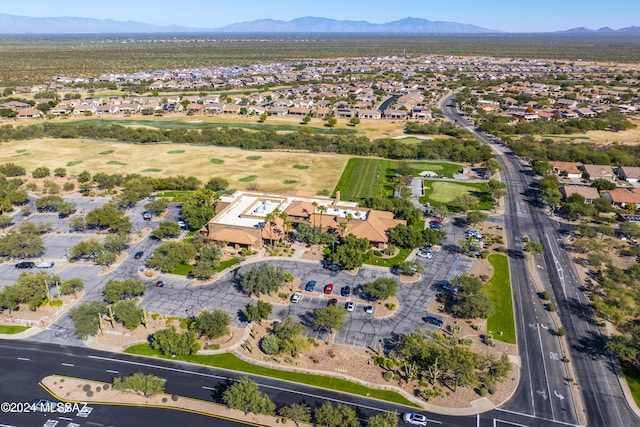 1955 E E Clf, Swallow Trail, Green Valley, AZ 85614 - aerial view of property and surrounding area featuring mountains and nearby suburban area
