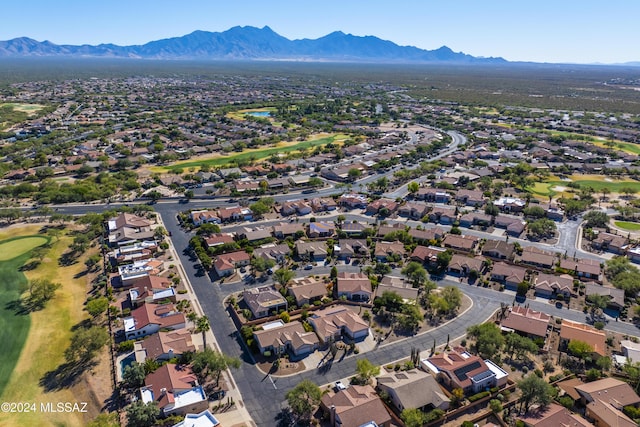 1955 E E Clf, Swallow Trail, Green Valley, AZ 85614 - aerial view of property's location featuring nearby suburban area, a golf course, and a mountainous background