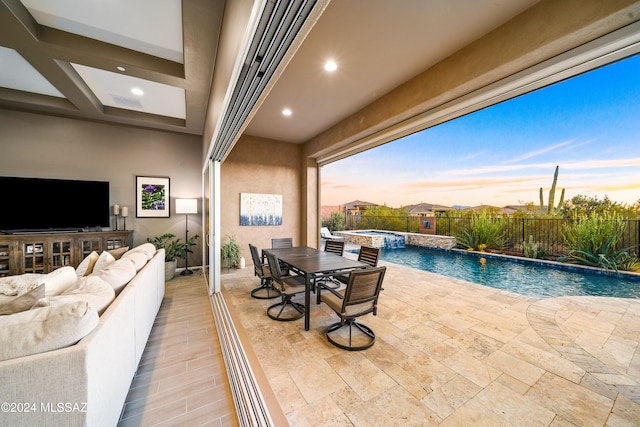 exterior space with pool water feature and a fenced in pool