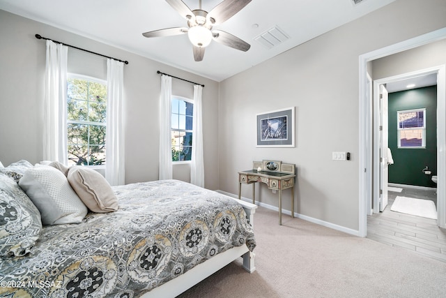 carpeted bedroom featuring ceiling fan