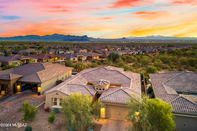 aerial view at dusk with a mountain view