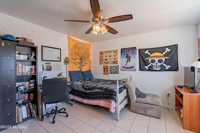 bedroom with ceiling fan and light tile patterned flooring