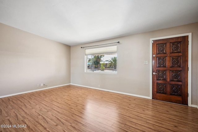 entrance foyer featuring hardwood / wood-style flooring