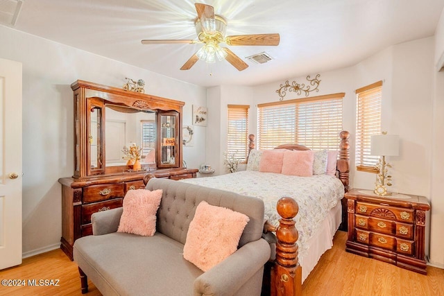 bedroom featuring light wood-type flooring and ceiling fan