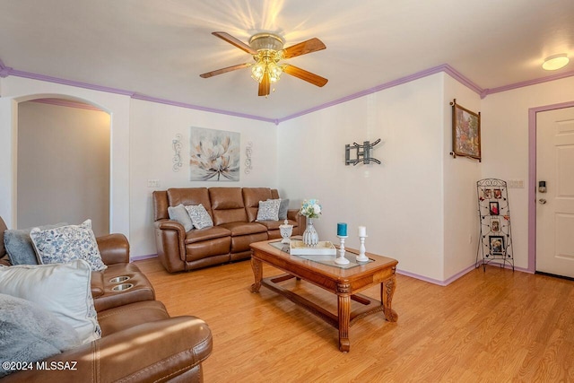 living room with ceiling fan, light hardwood / wood-style floors, and ornamental molding