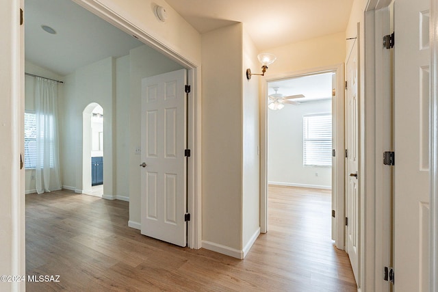 corridor featuring light hardwood / wood-style flooring