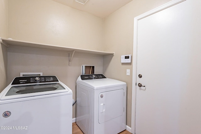 laundry room featuring washer and dryer