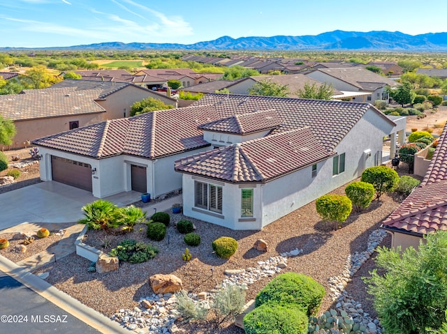 drone / aerial view featuring a mountain view