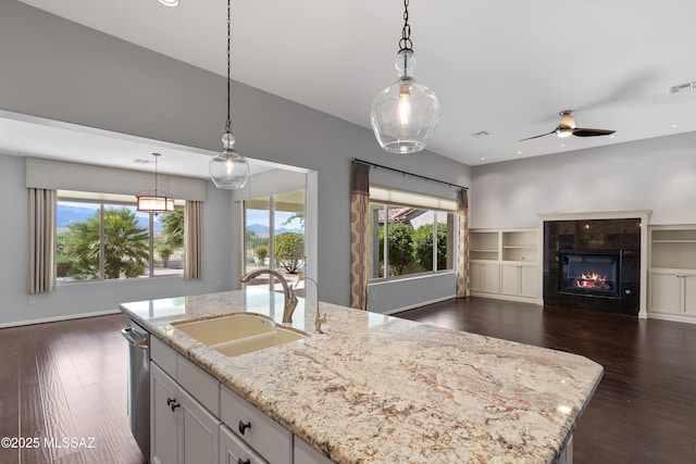 60241 E Arroyo Grande Dr, Oracle, AZ 85623 - kitchen with a sink, open floor plan, plenty of natural light, a kitchen island with sink, and recessed lighting