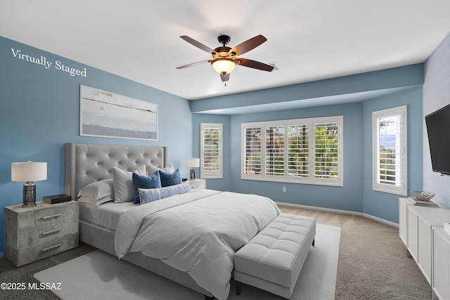 60241 E Arroyo Grande Dr, Oracle, AZ 85623 - bedroom with carpet, baseboards, and ceiling fan