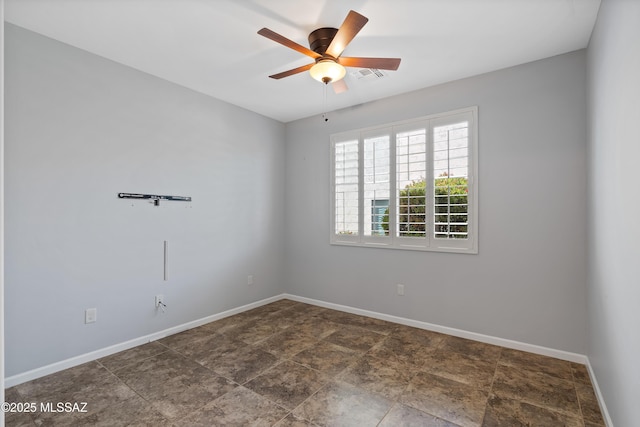 60241 E Arroyo Grande Dr, Oracle, AZ 85623 - spare room featuring ceiling fan and baseboards